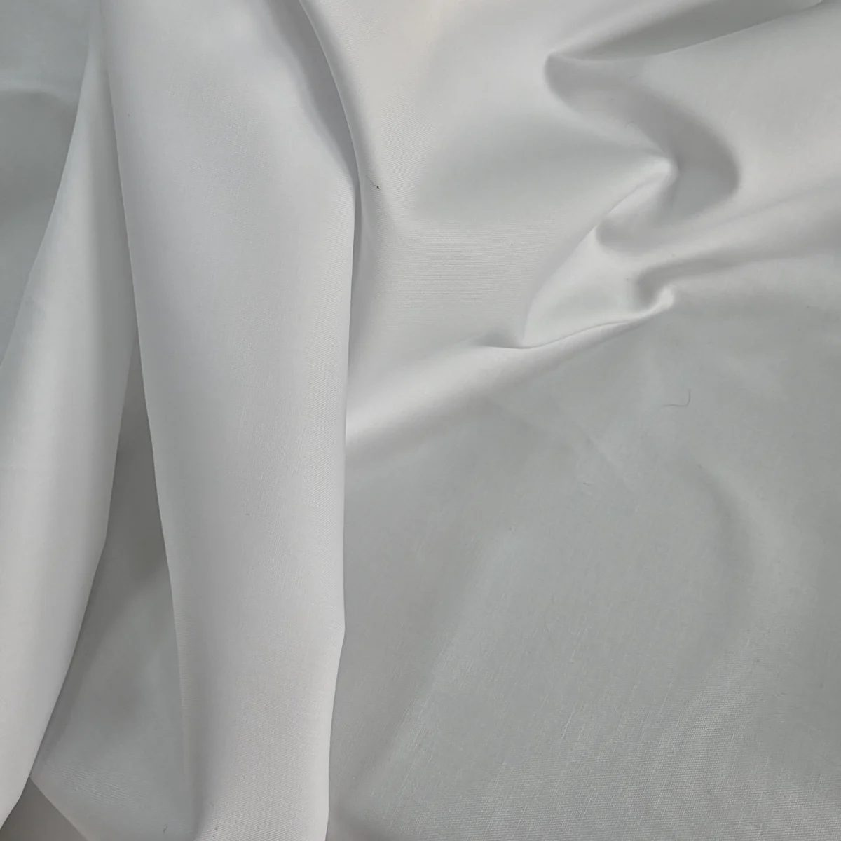 White 100% Japanese cotton fabric in soft folds