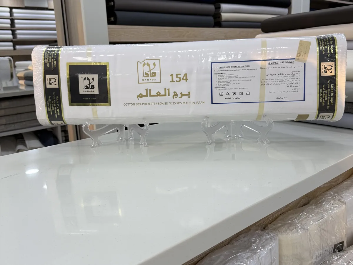 Roll of cotton No. 154 “Burj Al-Alam”, 50% cotton, on the display table