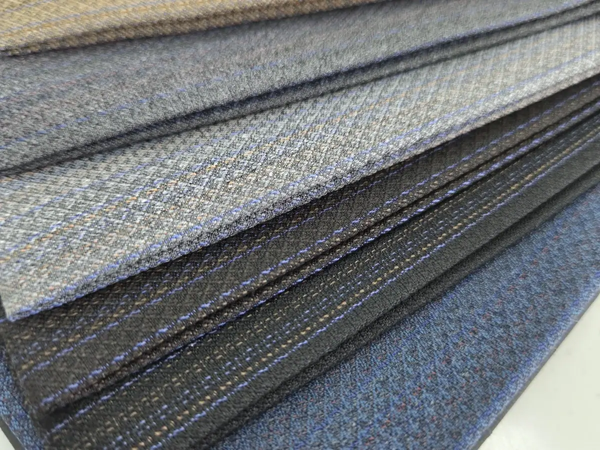Winter fabric samples with geometric patterns and coloured lines