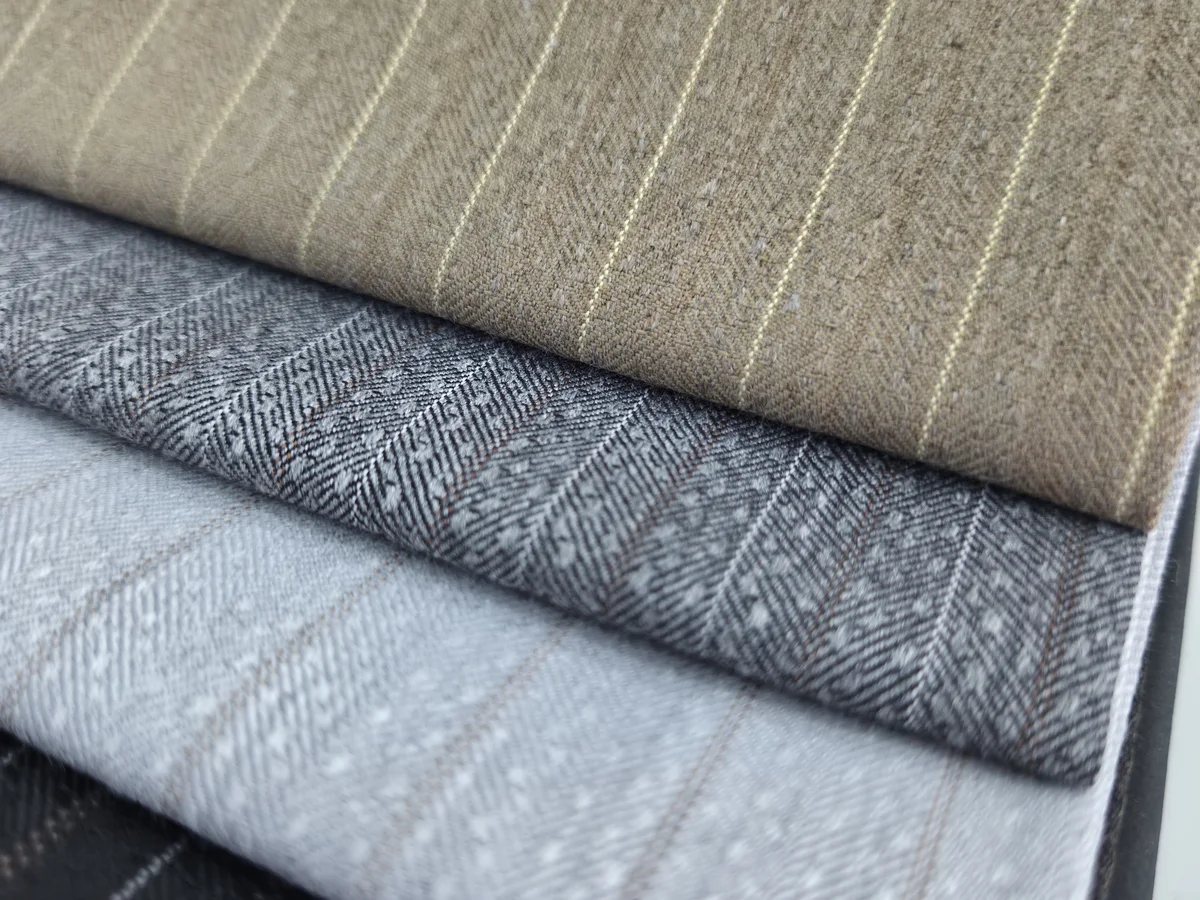 Striped winter fabric samples in white, brown and grey