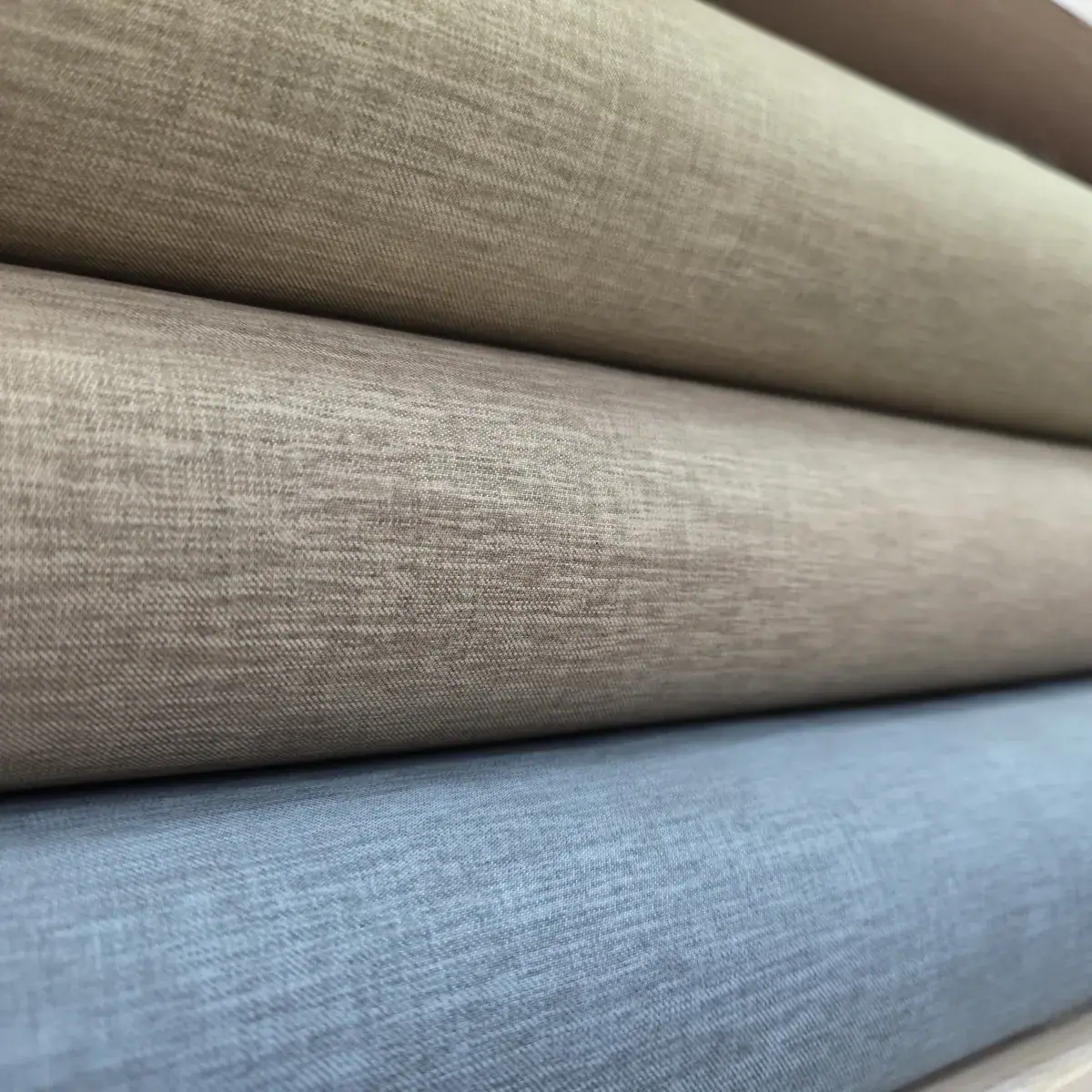 Three rolls of Korean fabric in olive, brown and grey-blue