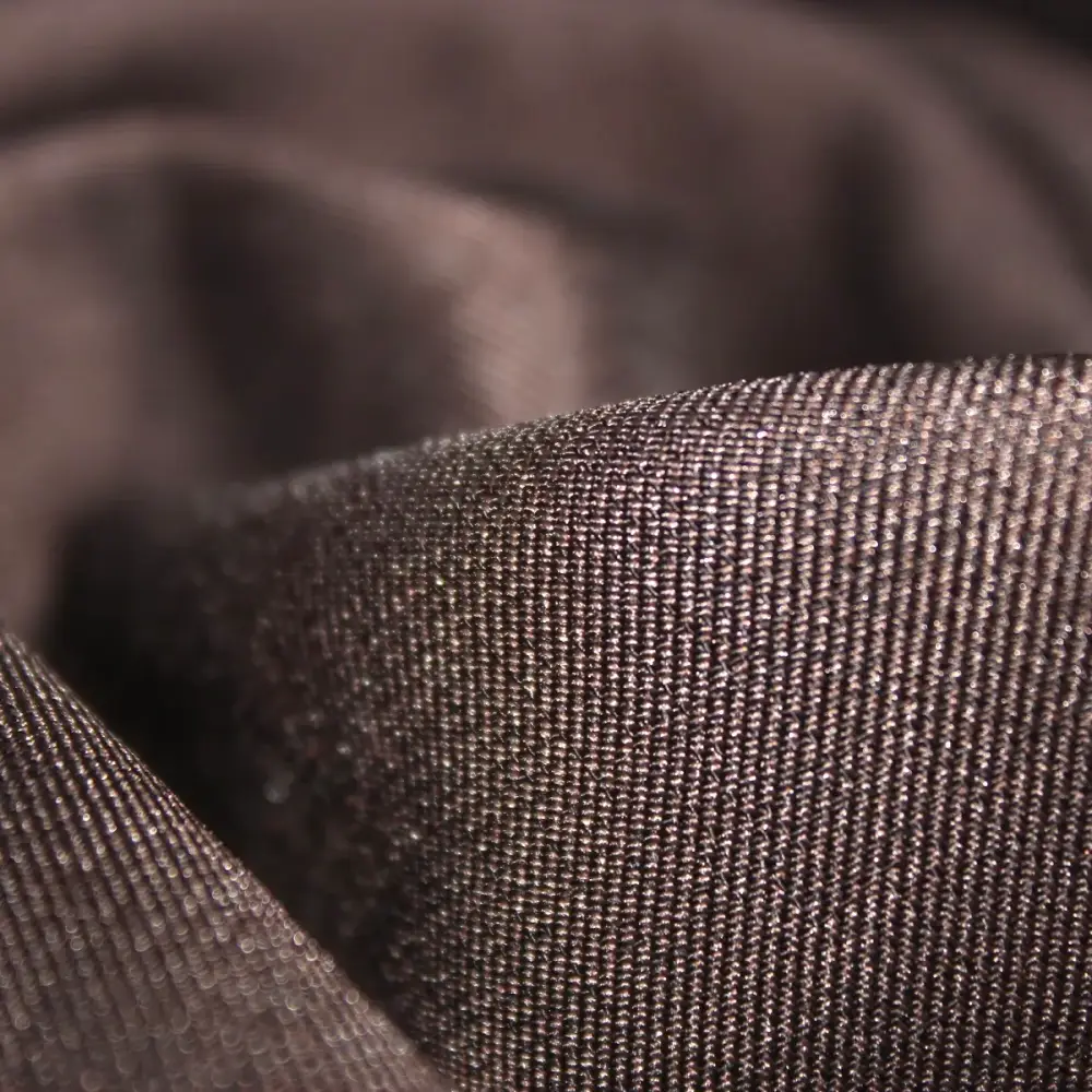 Close-up of the diagonal twill weave in brown Ramada Miss fabric
