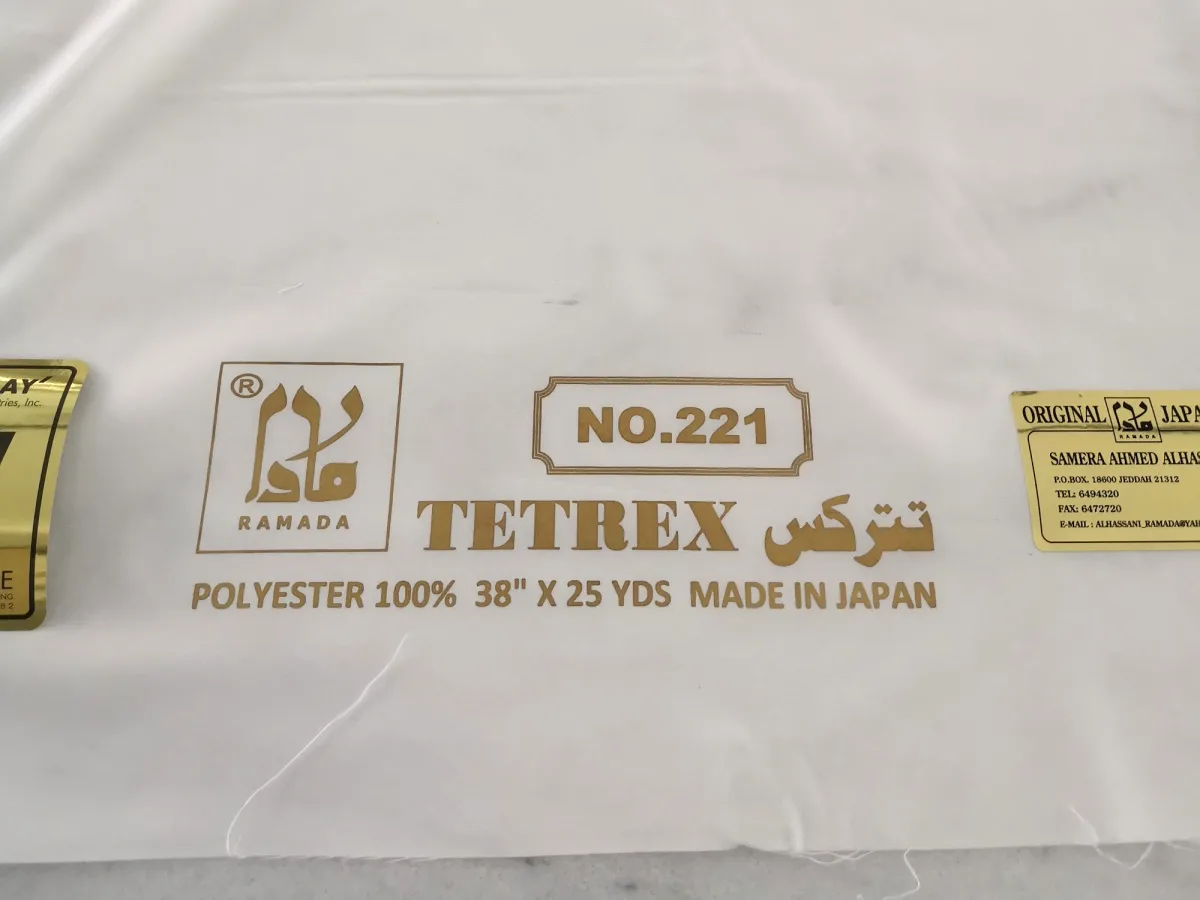 The “Tetrex — 100% polyester — Made in Japan” print on the fabric selvedge