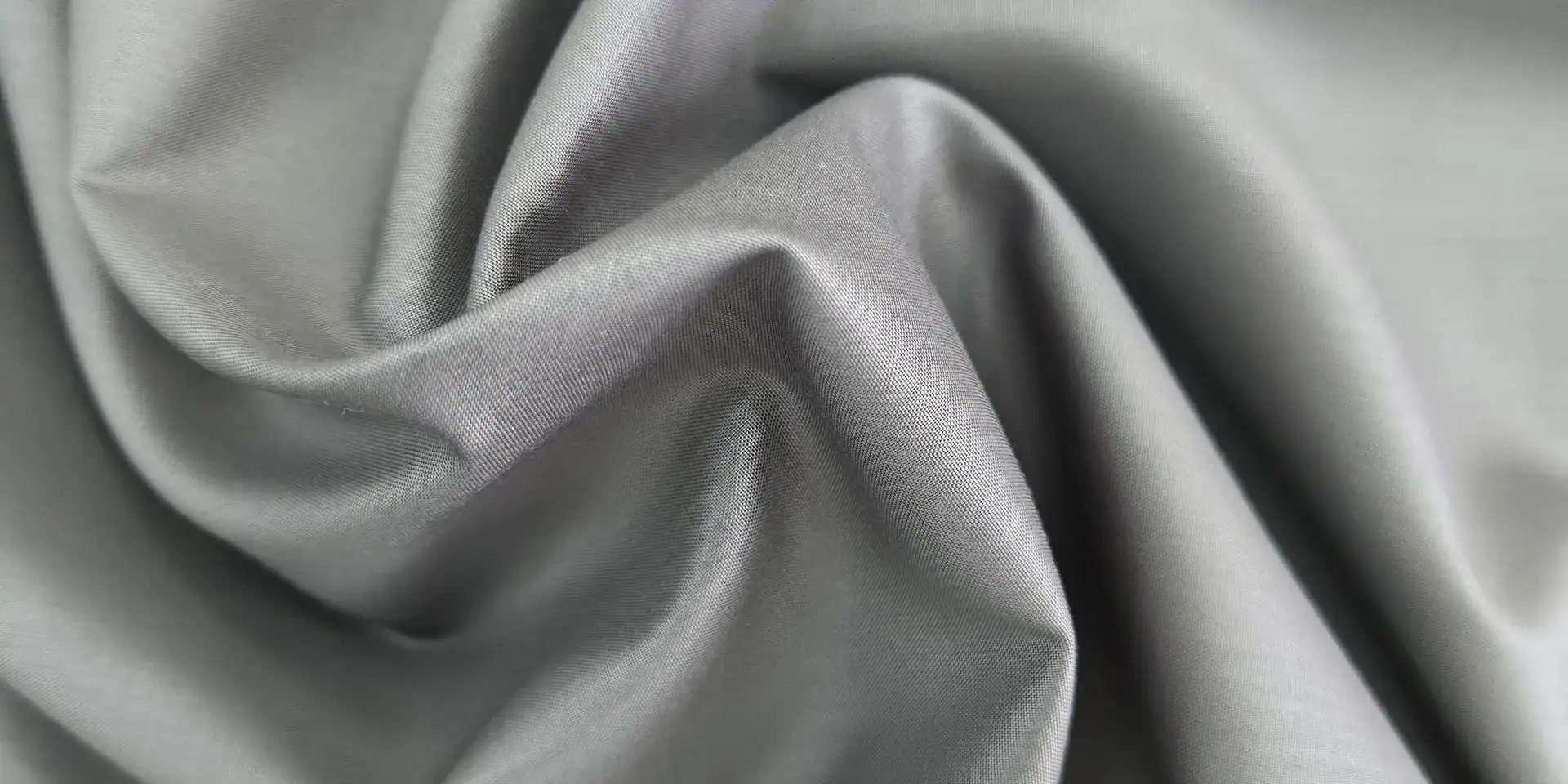 Grey fabric in soft folds
