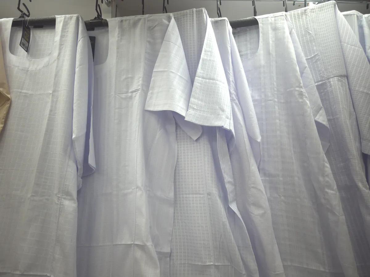 White Sudanese jalabiyas hanging at the Ramada Al-Raqi branch in Al-Balad